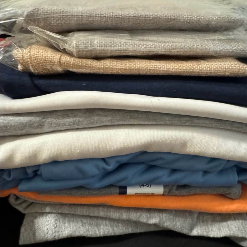 All blanks. Shirts, a sweatshirt, pillowcases, and blank garden flags! All sizes